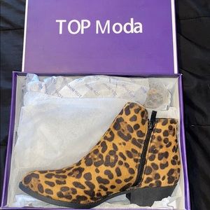 Size 8 pair of Top Moda leopard shoes